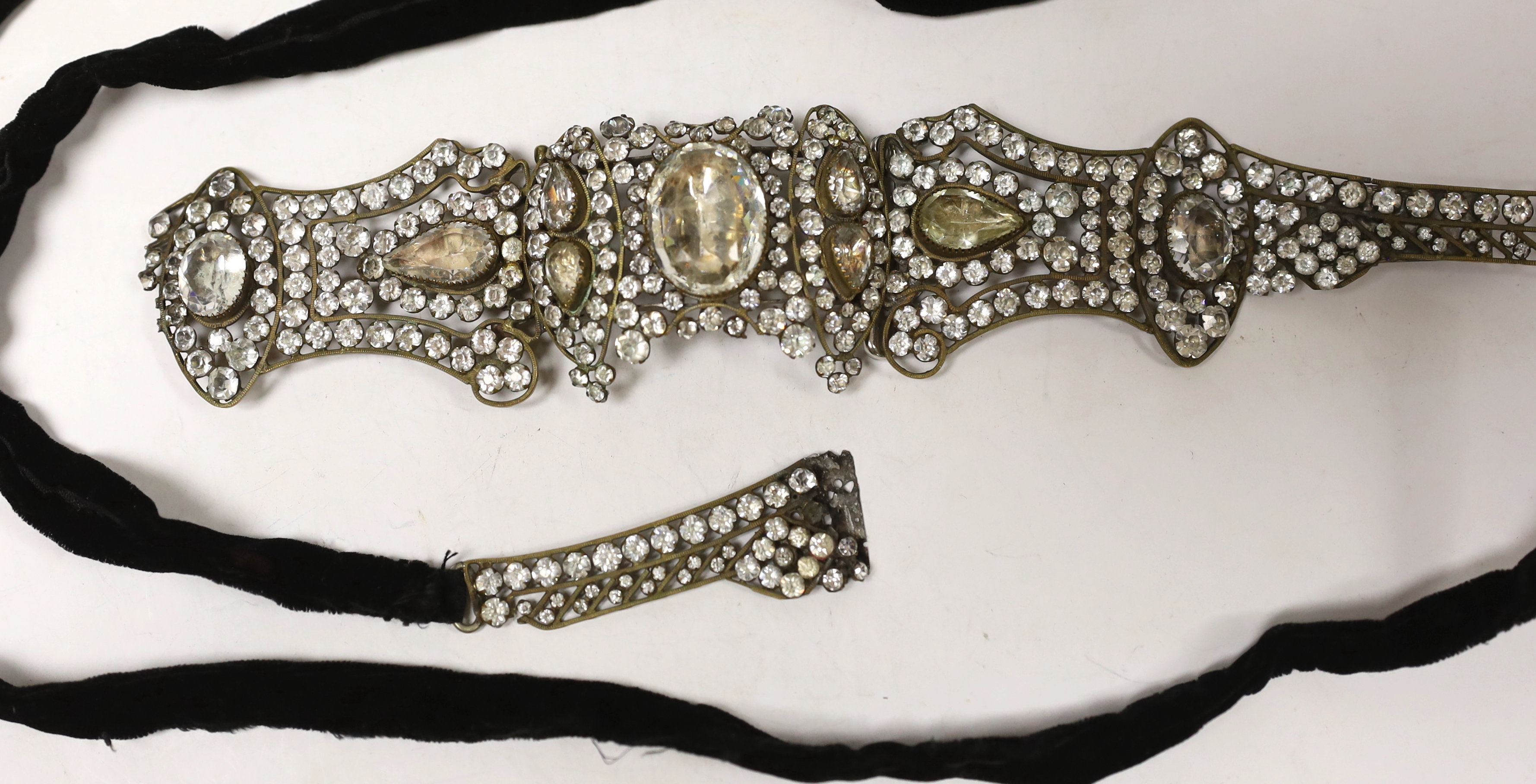 A paste cluster set black sash belt, (a.f.)